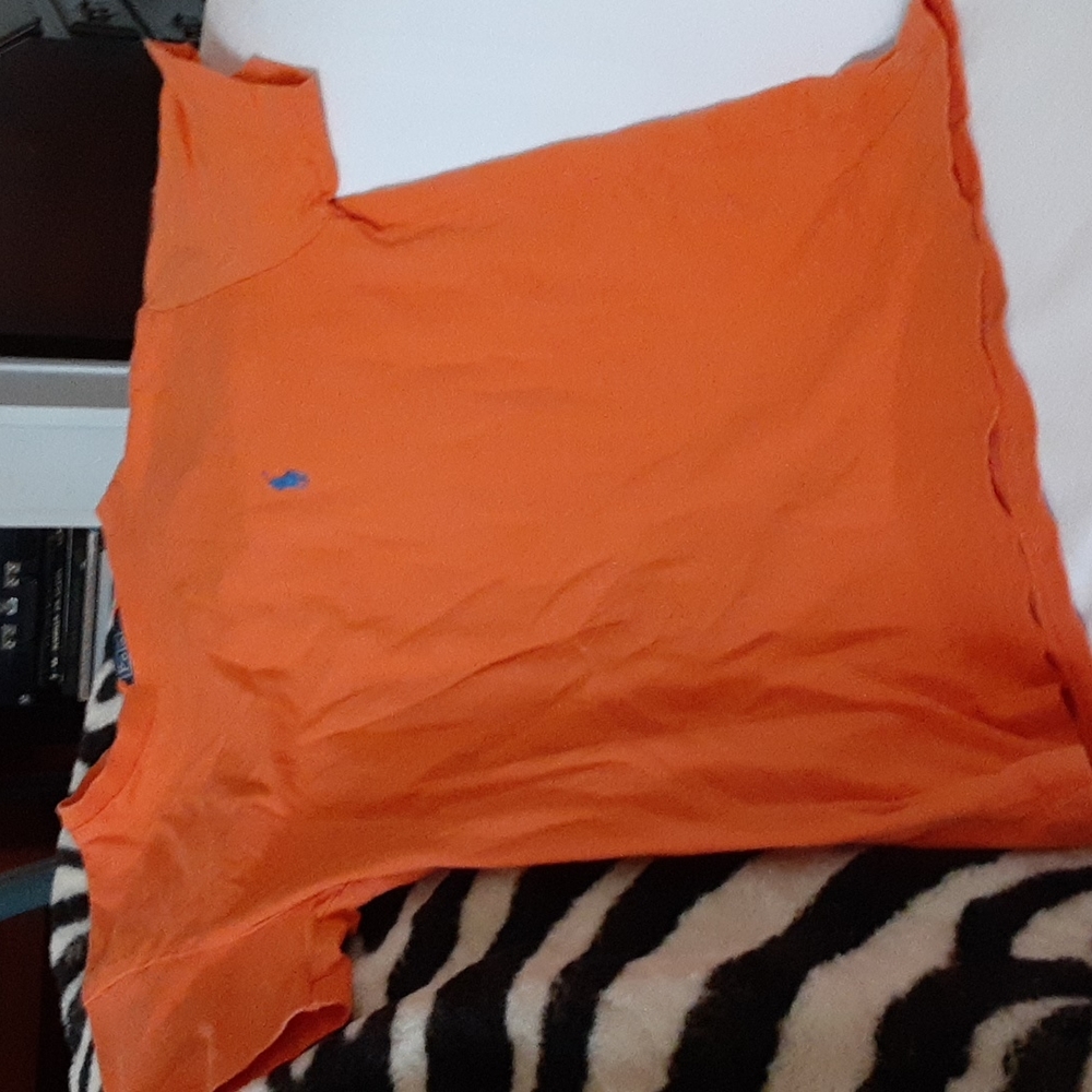 Boy's Polo t-shirt. Size 8. Orange with blue logo. Crew neck and short sleeves.